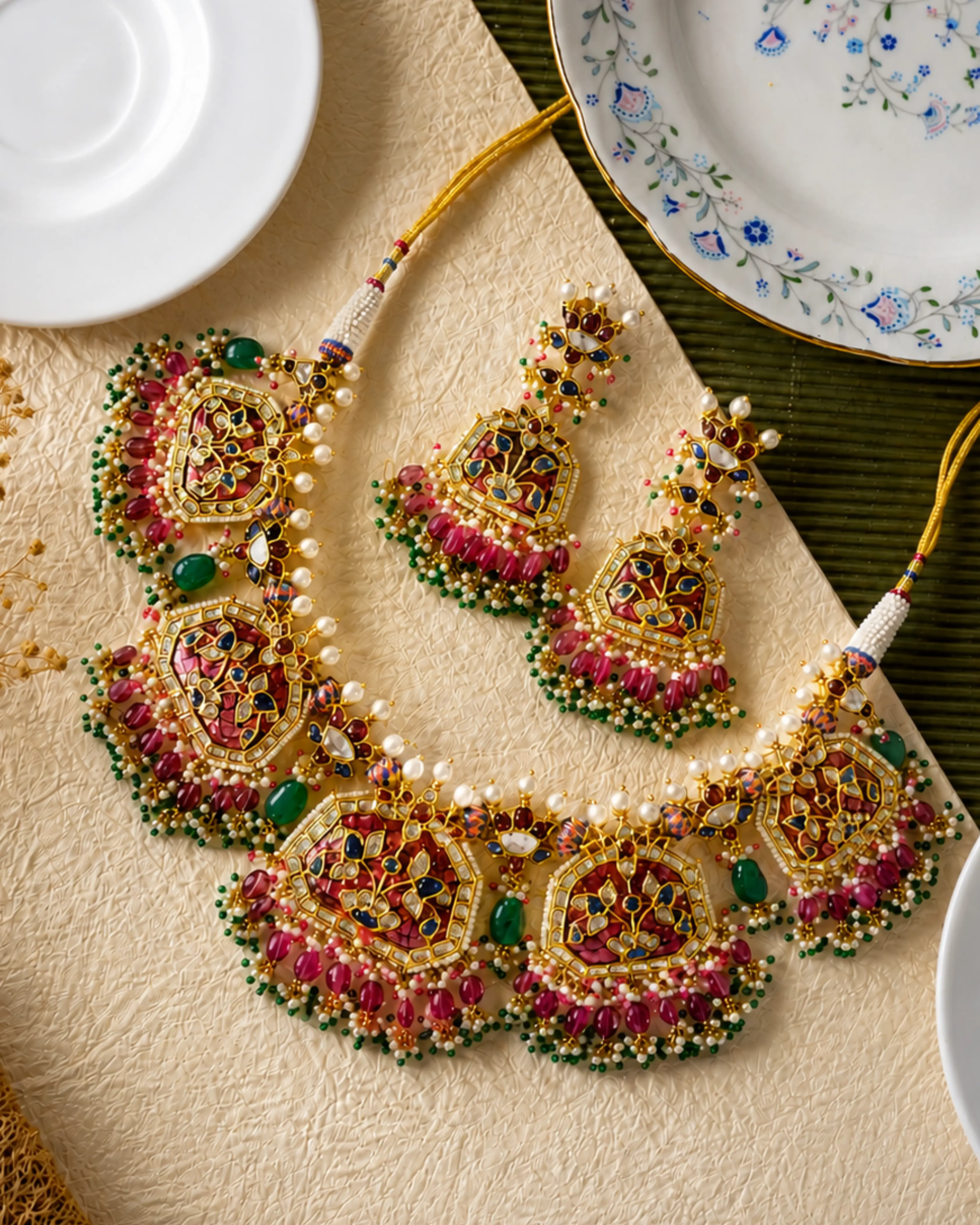 Bridal jadau set of polki panels with meenakari, ruby beads, emerald and pearl