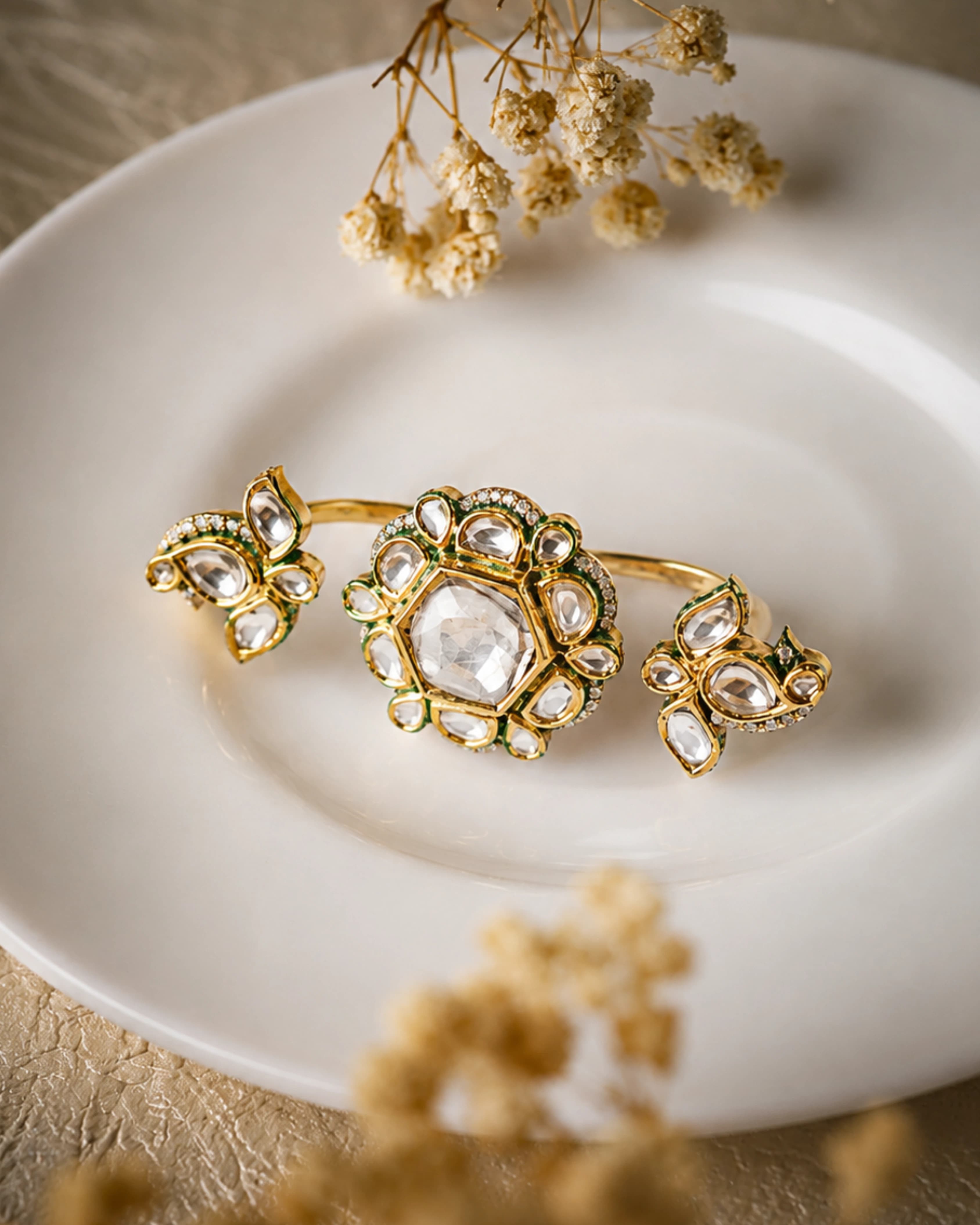 Sculptural polki ring in gold with green enamel and diamond detail